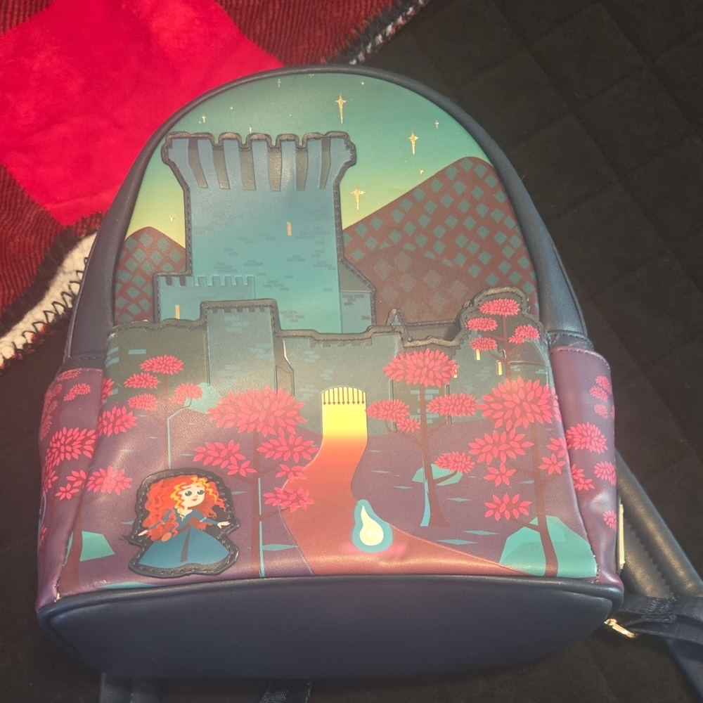 Loungefly Pixar Purple..Blue and Pink Backpack